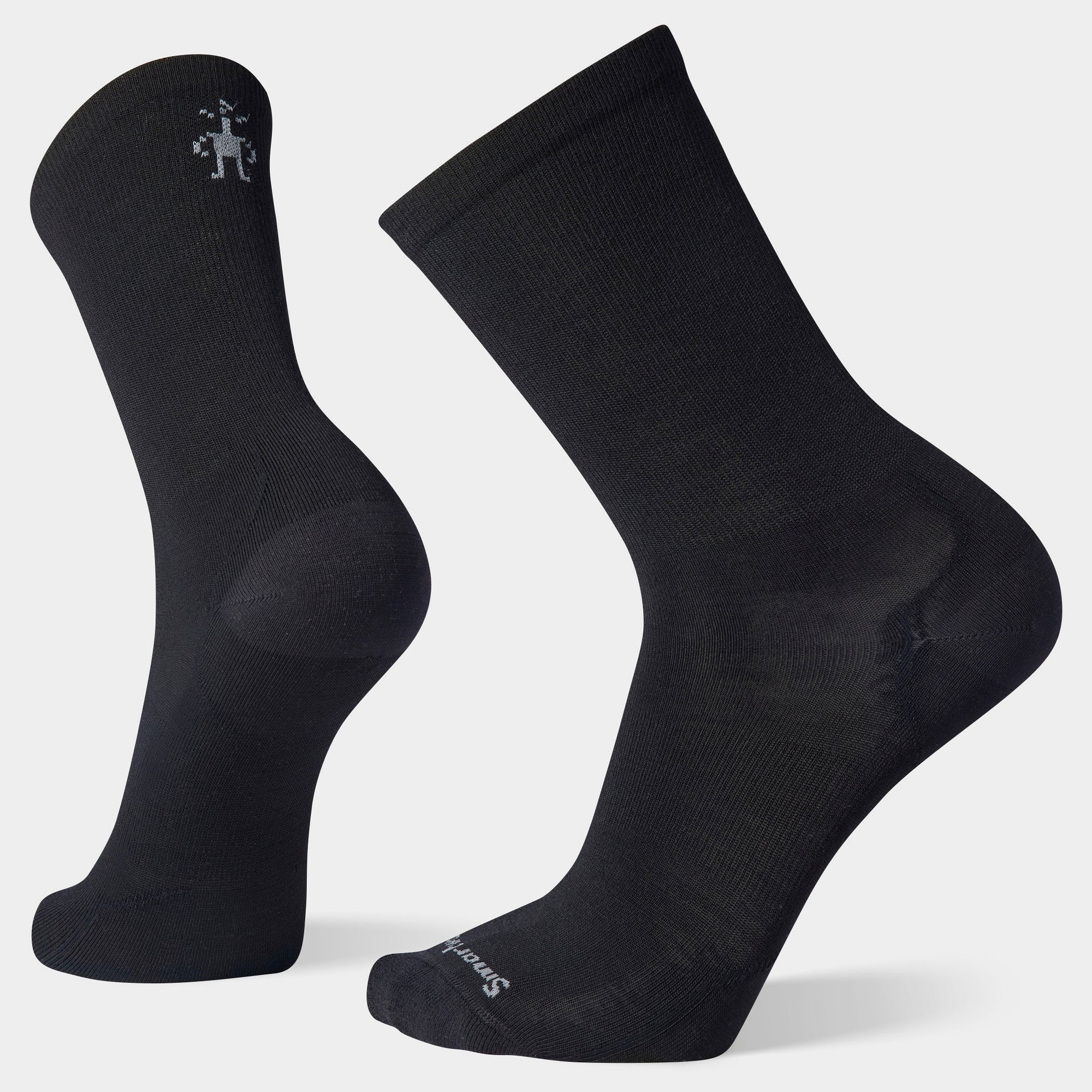 Black crew-length socks shown from side and back angles, displaying heel and logo detail