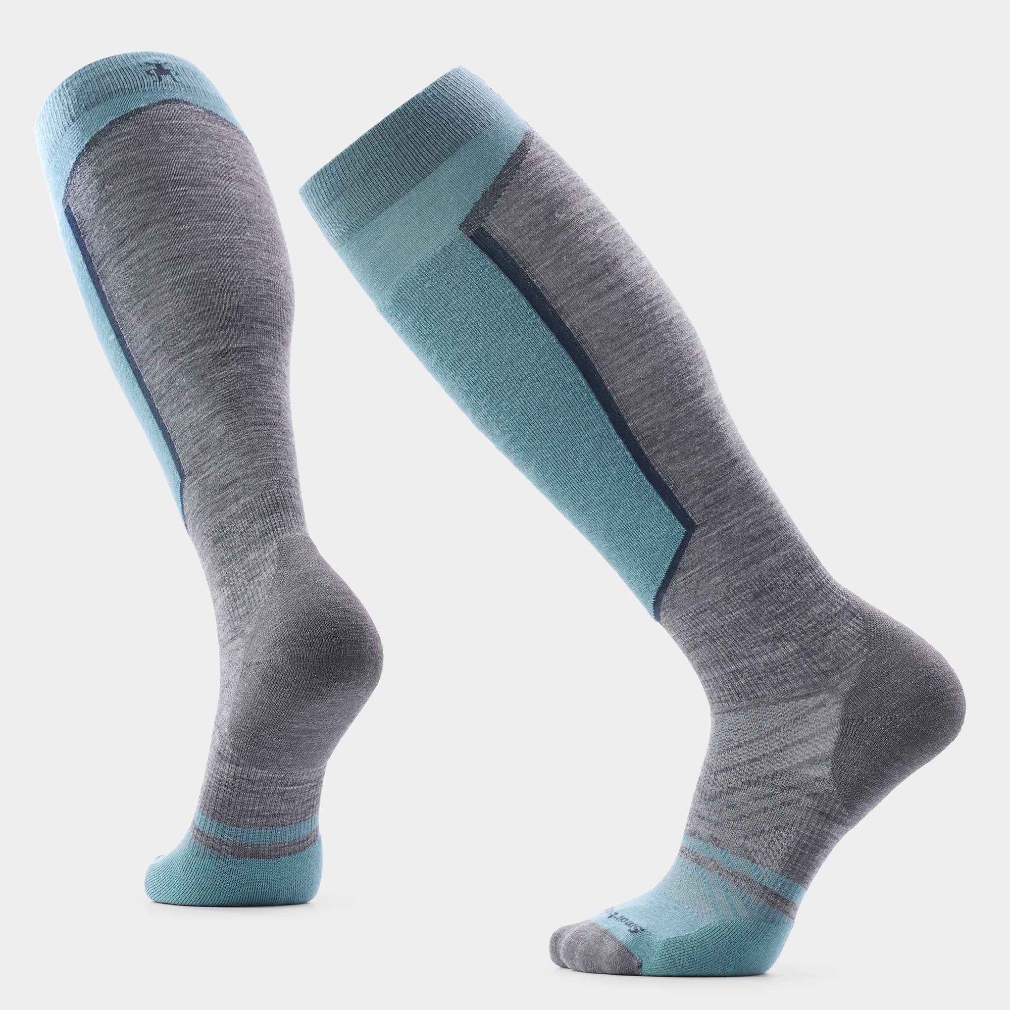 Over-the-calf ski socks in gray with teal accents, shown from front and back views