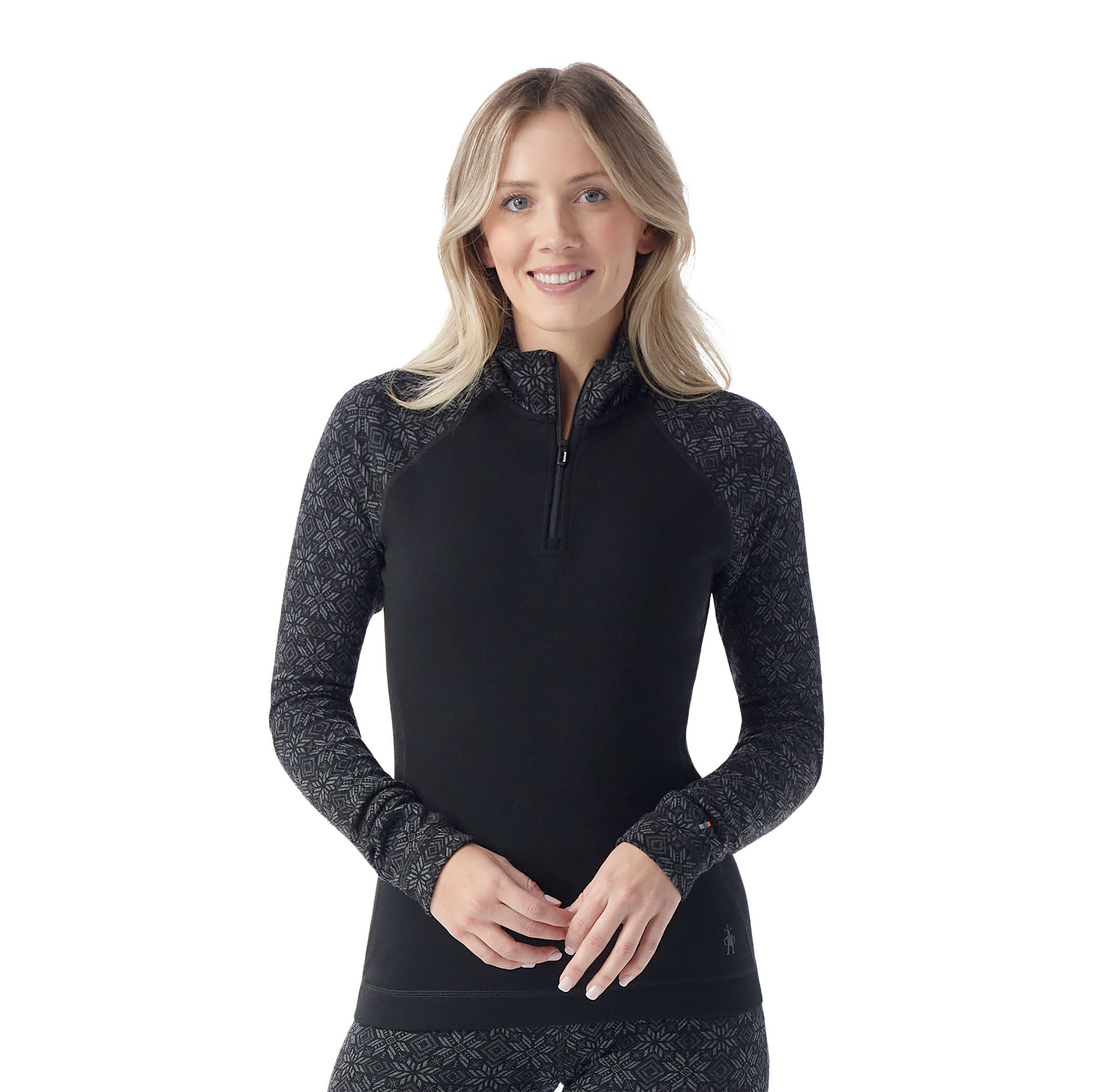 Women's long-sleeve quarter-zip base layer with black body and patterned fair isle sleeves, front view