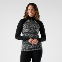 Women's thermal merino quarter-zip pullover with fair isle print front and solid black sleeves, front view