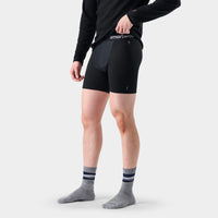 Men's black compression boxer brief shorts with branded waistband, front on-model view