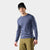 Men's long-sleeve merino wool base layer crew in heather blue, front on-model view