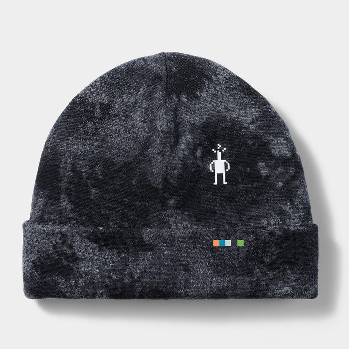 Dark tie-dye cuffed beanie with pixel robot logo and colorful stripe detail on cuff