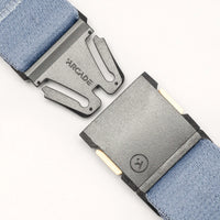 Light blue webbing belt with silver metal buckle shown unbuckled on white background