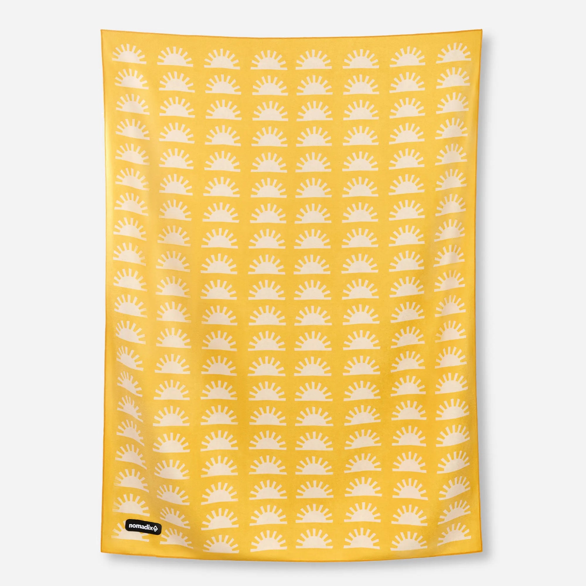 Yellow blanket towel with white sun pattern displayed flat against neutral background