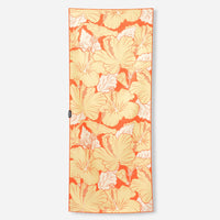 Rectangular towel with tropical hibiscus flower pattern in orange and yellow tones