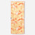 Rectangular towel with tropical hibiscus flower pattern in orange and yellow tones