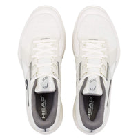 Top-down view of a pair of white tennis shoes with grey insoles and laces