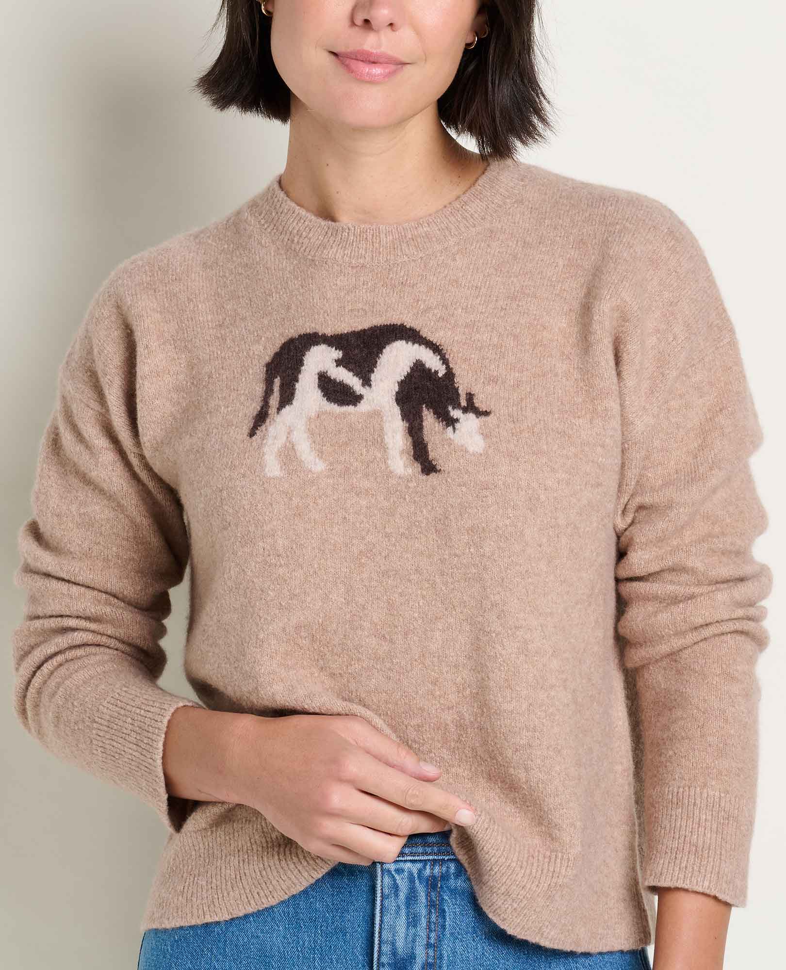 Women's beige crew neck sweater with black and white grazing horse intarsia knit graphic, front view