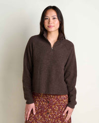 Women's cropped quarter-zip fleece pullover in dark brown, front view on model