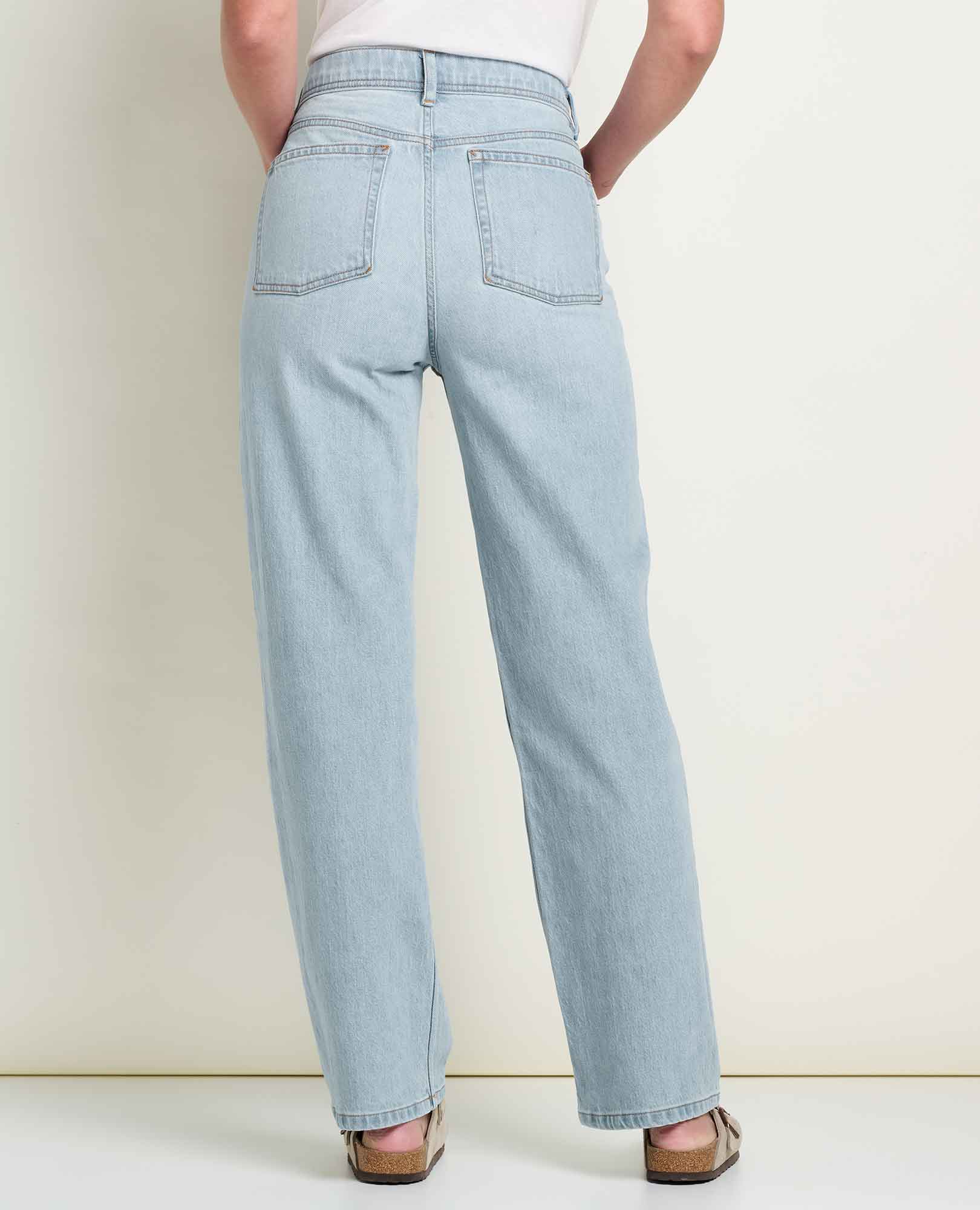 Women's straight-leg light wash jeans, back view showing two back pockets and wide leg