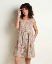 Sleeveless tiered tank dress with small floral print and button front detail