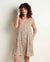 Sleeveless tiered tank dress with small floral print and button front detail