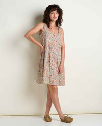Sleeveless tiered tank dress with small floral print, knee length, modeled front view