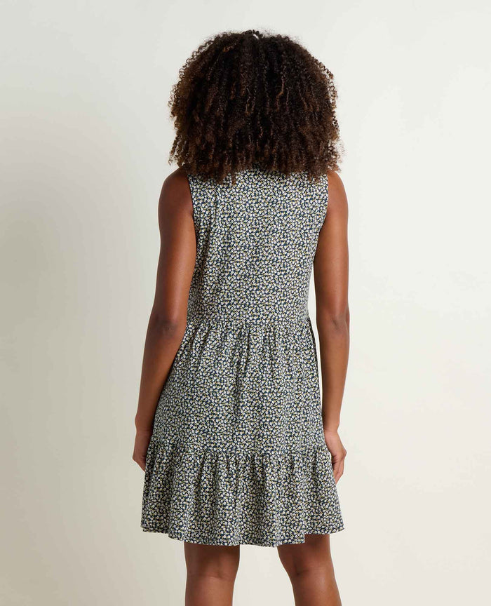 Sleeveless tiered dress with small floral print, back view on model