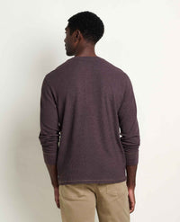 Men's long-sleeve thermal henley in dark burgundy, back view on model with khaki pants