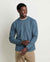 Men's long-sleeve waffle-knit crew neck pullover in muted teal, front view on model