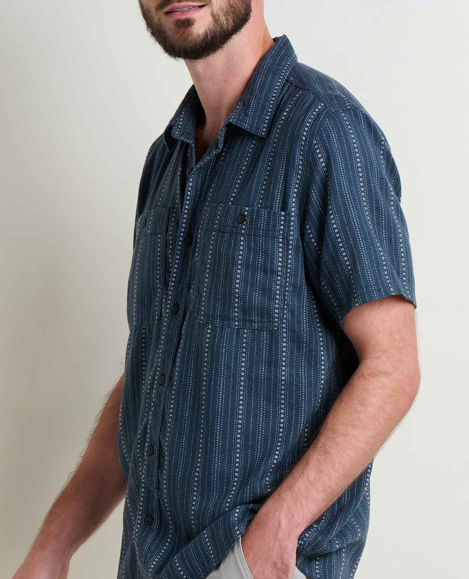 Navy blue short sleeve button-up shirt with white dotted stripe pattern, three-quarter view