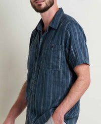 Navy blue short sleeve button-up shirt with white dotted stripe pattern, three-quarter view