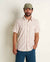 Short-sleeve button-up shirt with geometric diamond pattern in red and brown on cream base