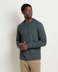 Men's long-sleeve waffle-knit crew neck pullover in dark teal pattern, front view on model