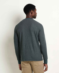 Men's long-sleeve waffle-knit crew neck shirt, back view, with contrast ribbed cuffs and khaki pants