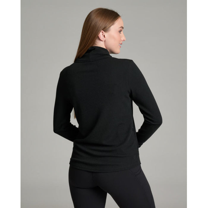 Black ribbed turtleneck pullover, back view on female model with leggings