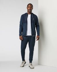Men's full-zip hooded athletic jacket in dark navy heather, front view, full body