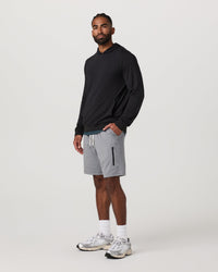 Men's grey heather athletic shorts with drawstring waist and zip pocket, full front view on model