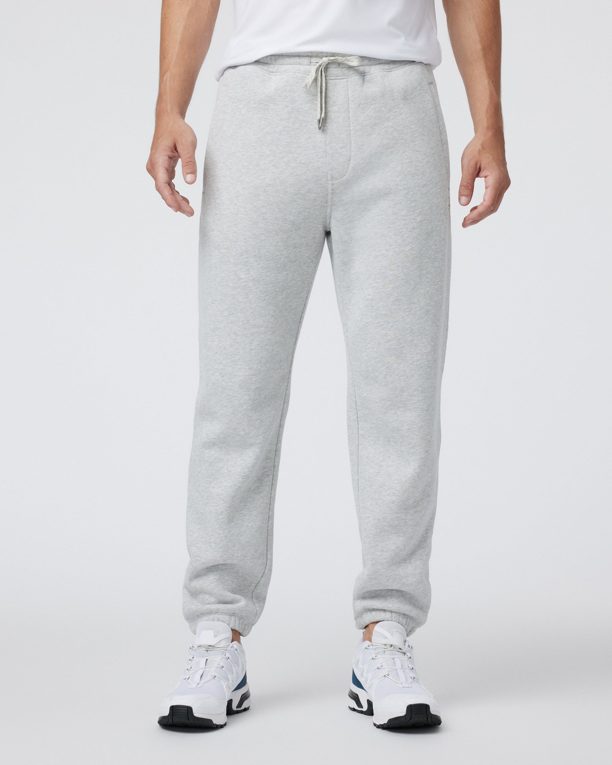 Men's grey fleece sweatpants with elastic cuffs and drawstring waist, front view
