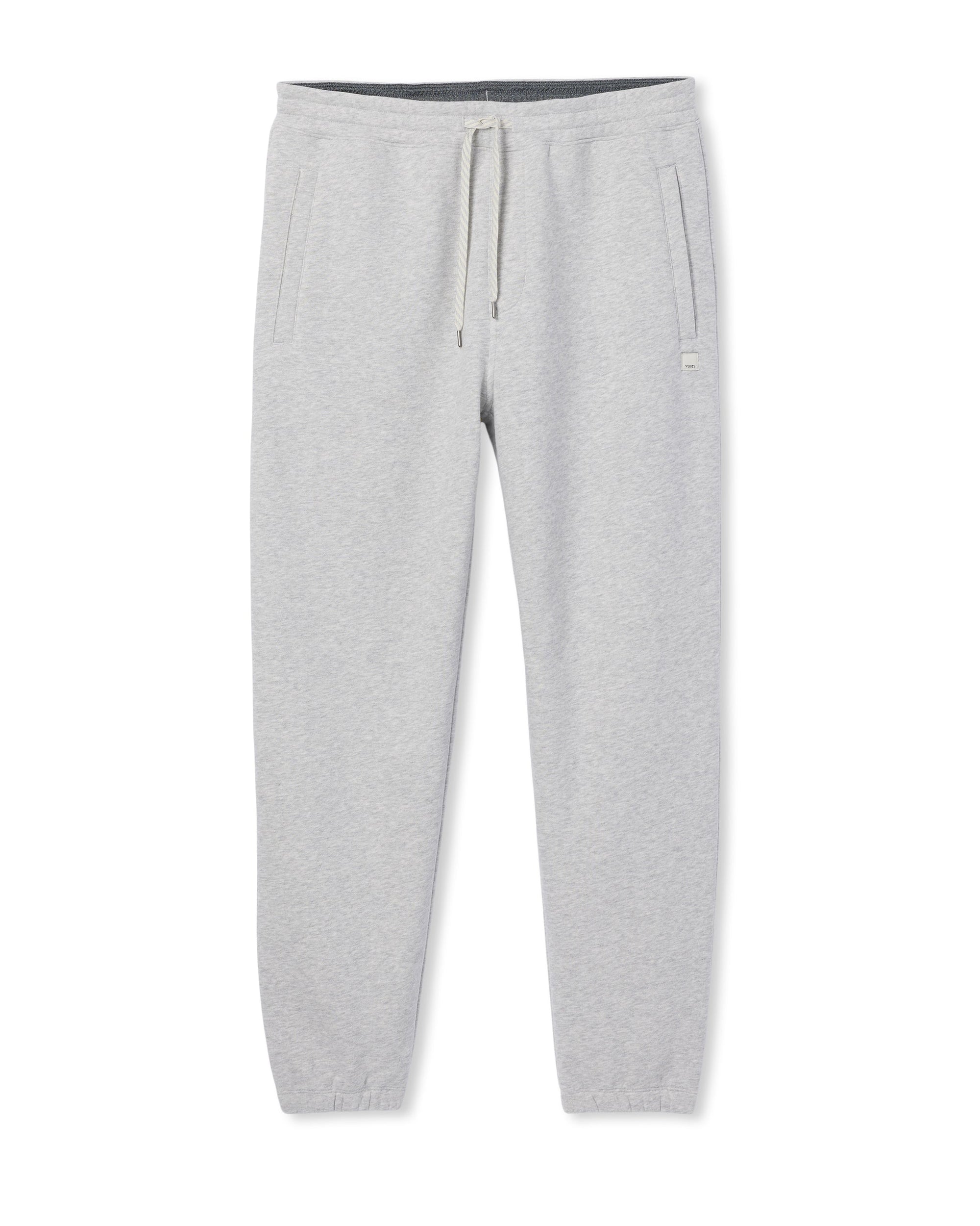 Light grey men's jogger sweatpants with drawstring waist and tapered cuffed ankles, flat lay view