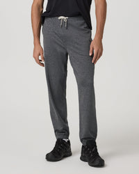 Men's heathered charcoal sweatpants with white drawstring waist, tapered fit, front view