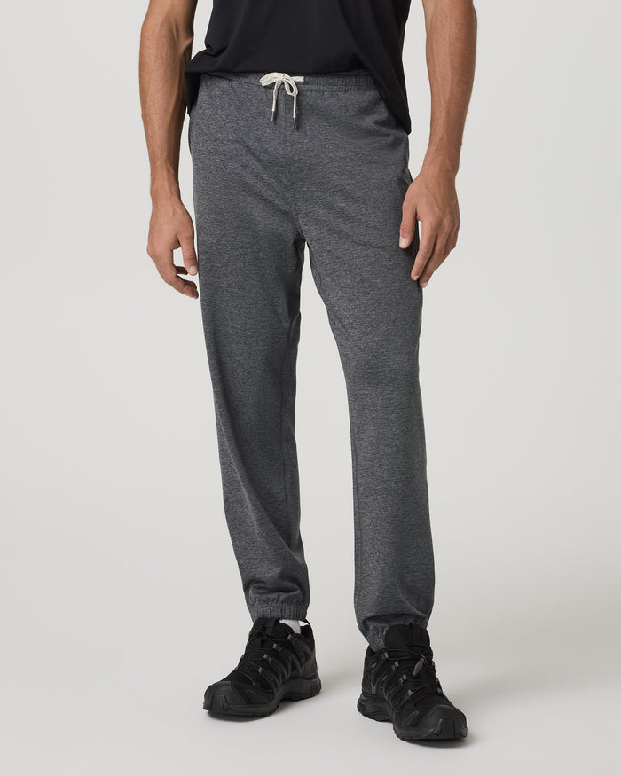 Men's heathered charcoal sweatpants with white drawstring waist, tapered fit, front view