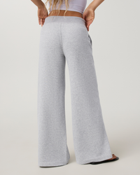 Wide-leg sweatpants in heather grey, back view on model, mid-rise waistband