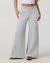 Women's wide-leg sweatpants in heather grey with high waistband, front view on model