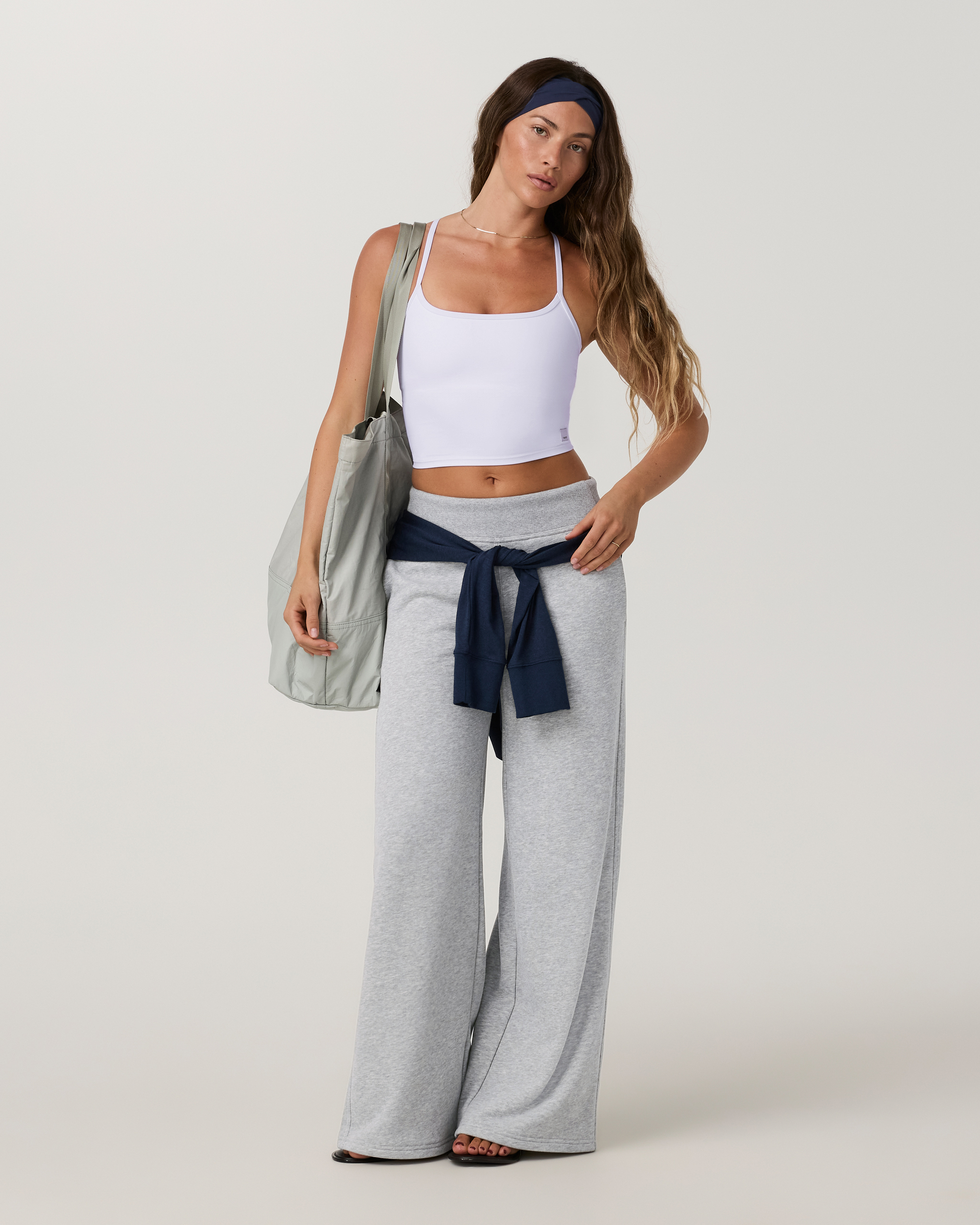 Wide-leg midrise sweatpants in heather grey with folded waistband, full front view on model