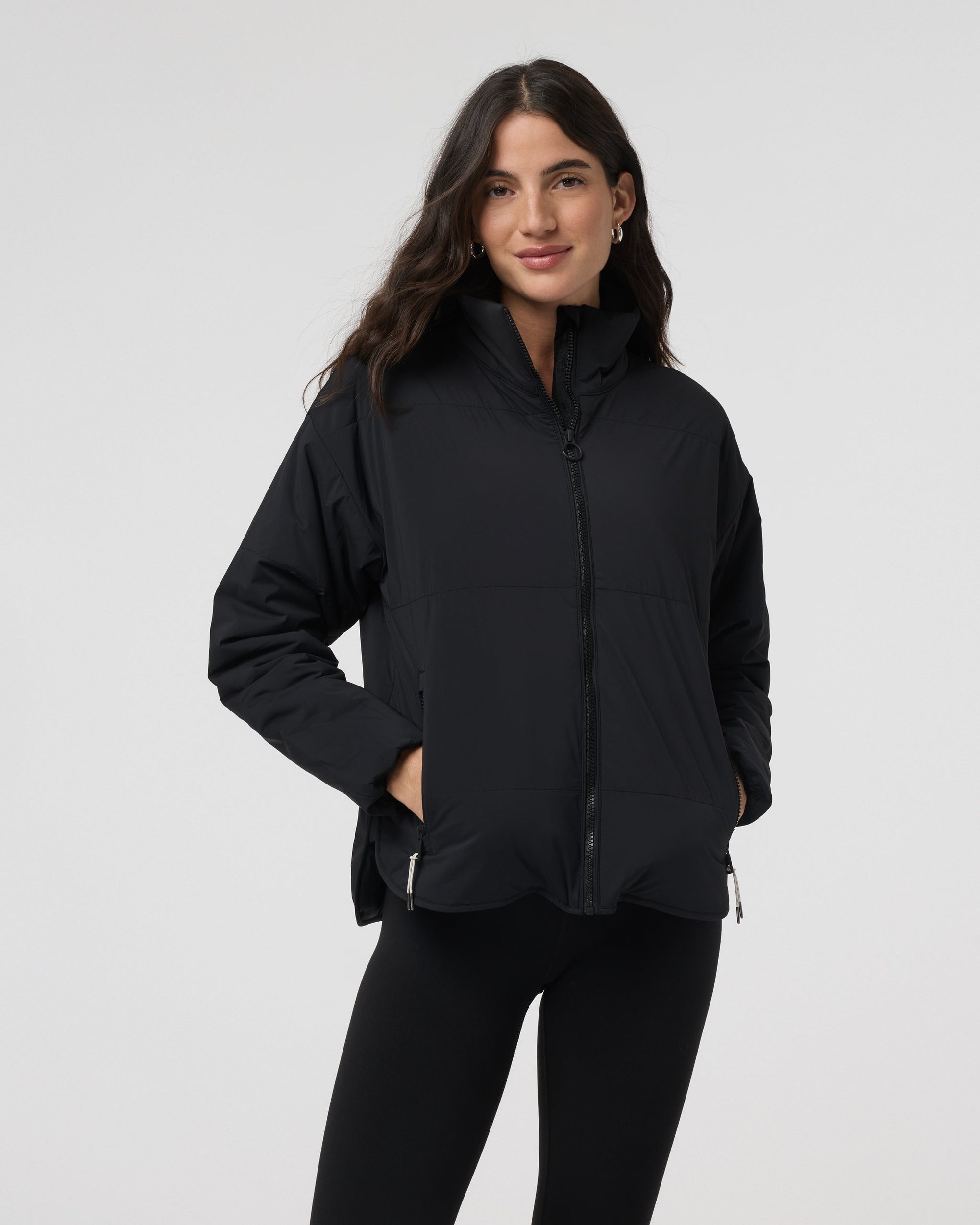 Women's black insulated zip-up jacket with stand collar, front view on model