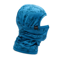 Teal balaclava with mountain and forest print pattern, shown with neck gaiter draping