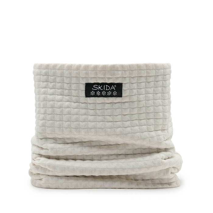 Quilted grid-textured neck warmer gaiter in off-white, folded flat, front view