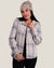 Women's plaid flannel shirt in light gray tones, open over black top, front model view