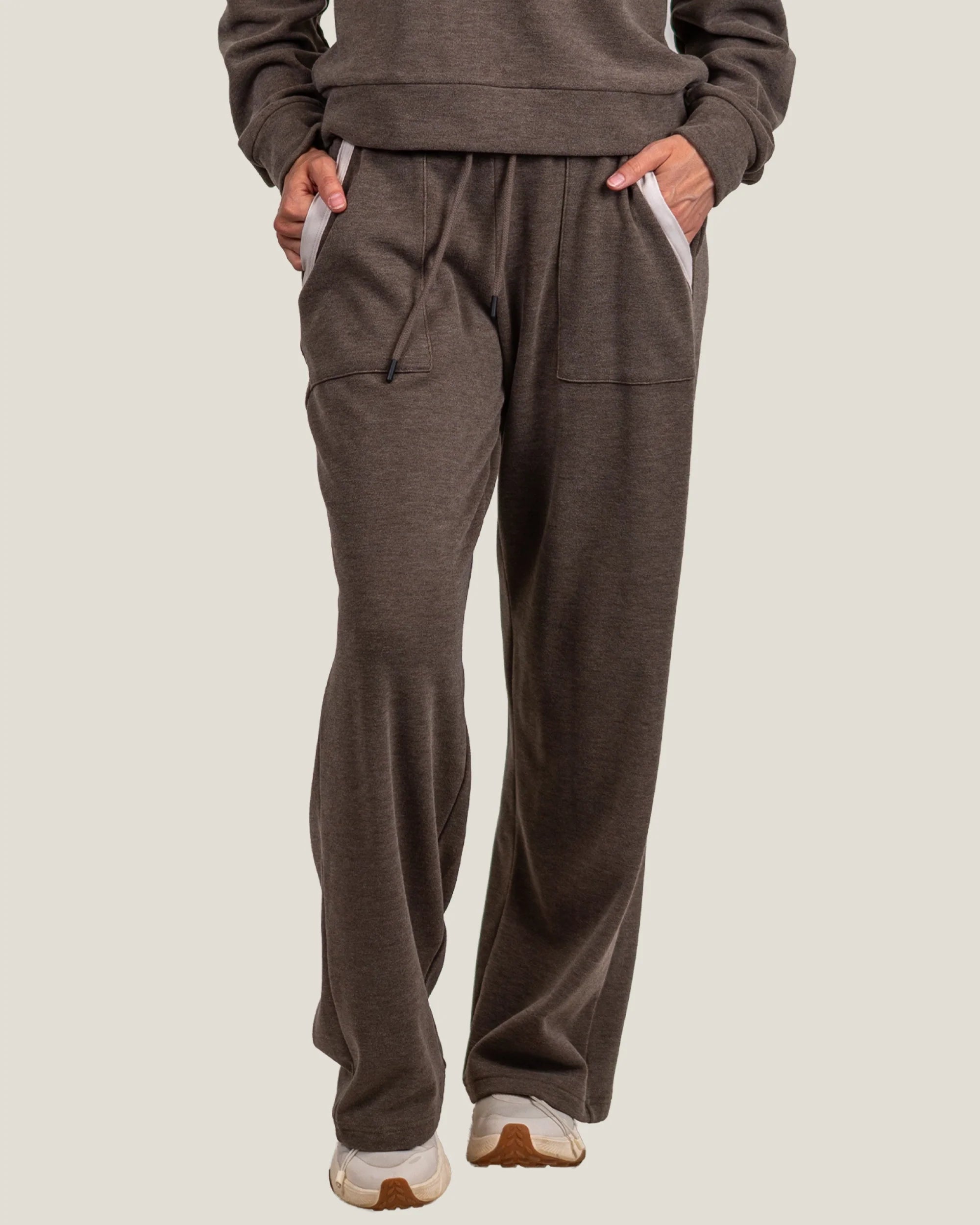 Wide-leg fleece sweatpants with contrast pocket trim and drawstring waist, front view