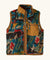 Kids' sherpa fleece vest with colorful print, full zip, and tan chest pocket, front view