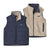 Reversible kids vest showing both sides: navy quilted exterior and cream sherpa fleece interior