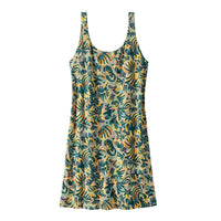 Sleeveless dress with colorful tropical botanical print in teal and yellow tones, front view