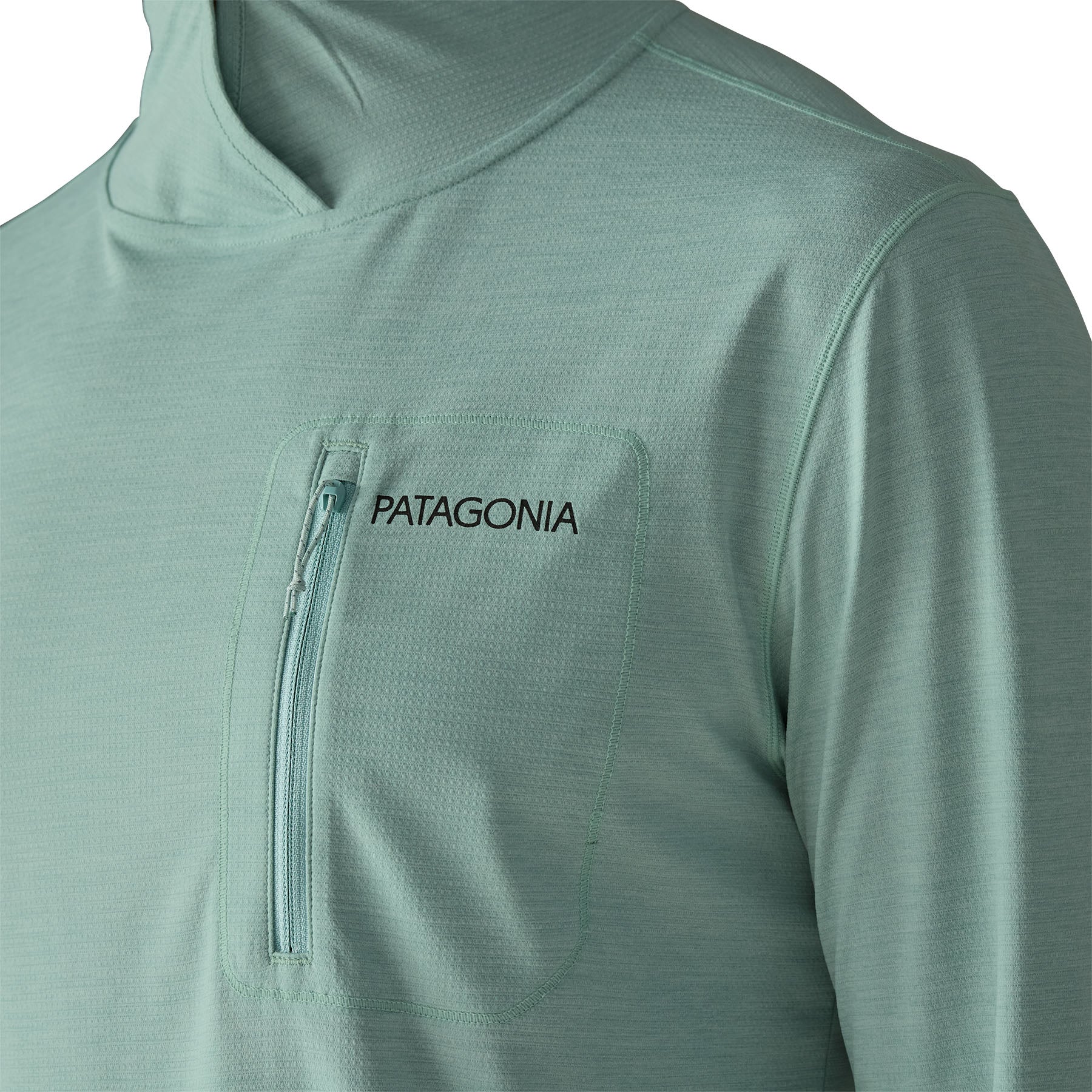 Sage green hooded sun shirt with chest zip pocket, front detail view