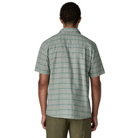 Light blue plaid short-sleeve button-up shirt shown from back view on model