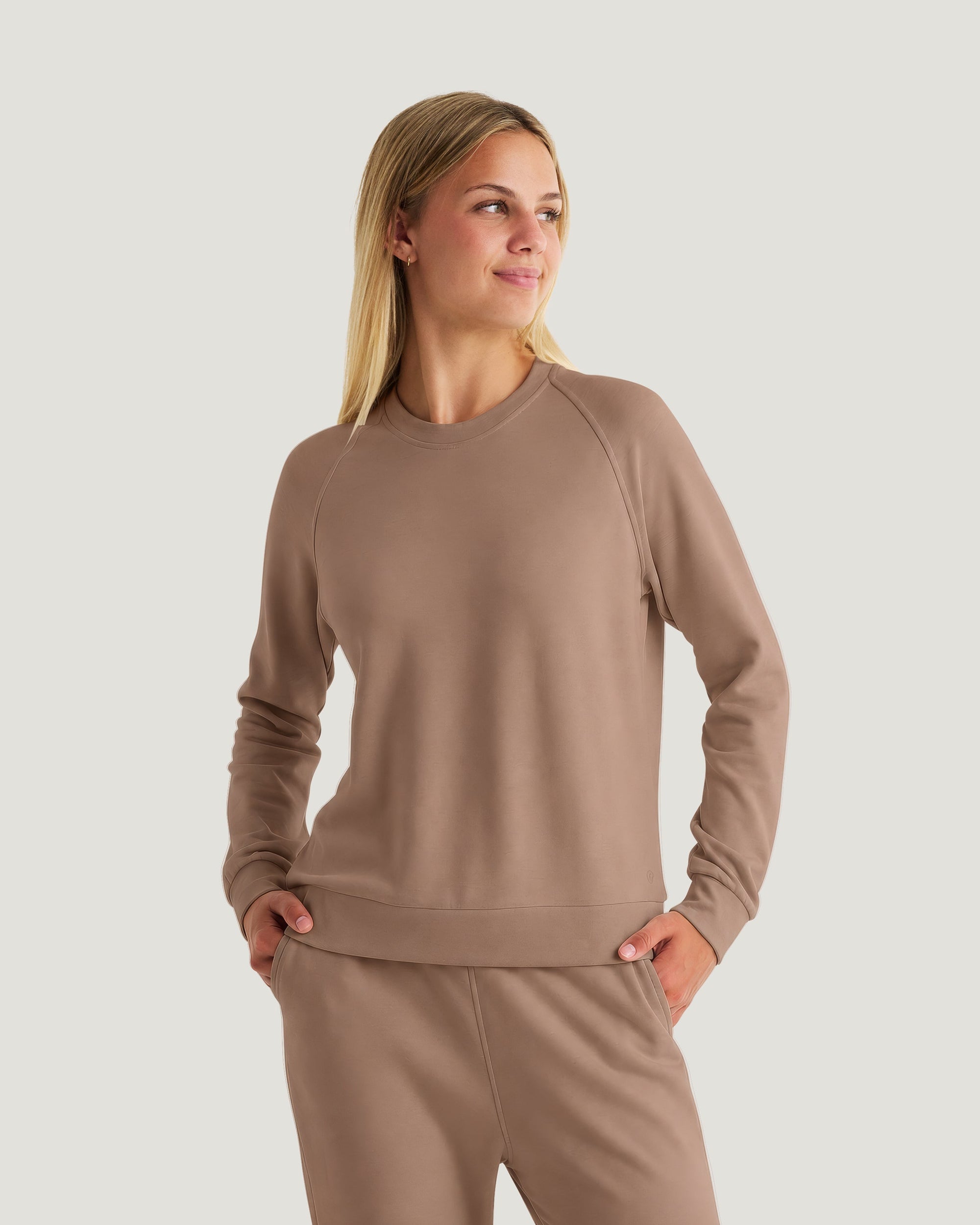 Women's lightweight fleece crew sweatshirt in warm taupe, front view, raglan sleeves, ribbed hem