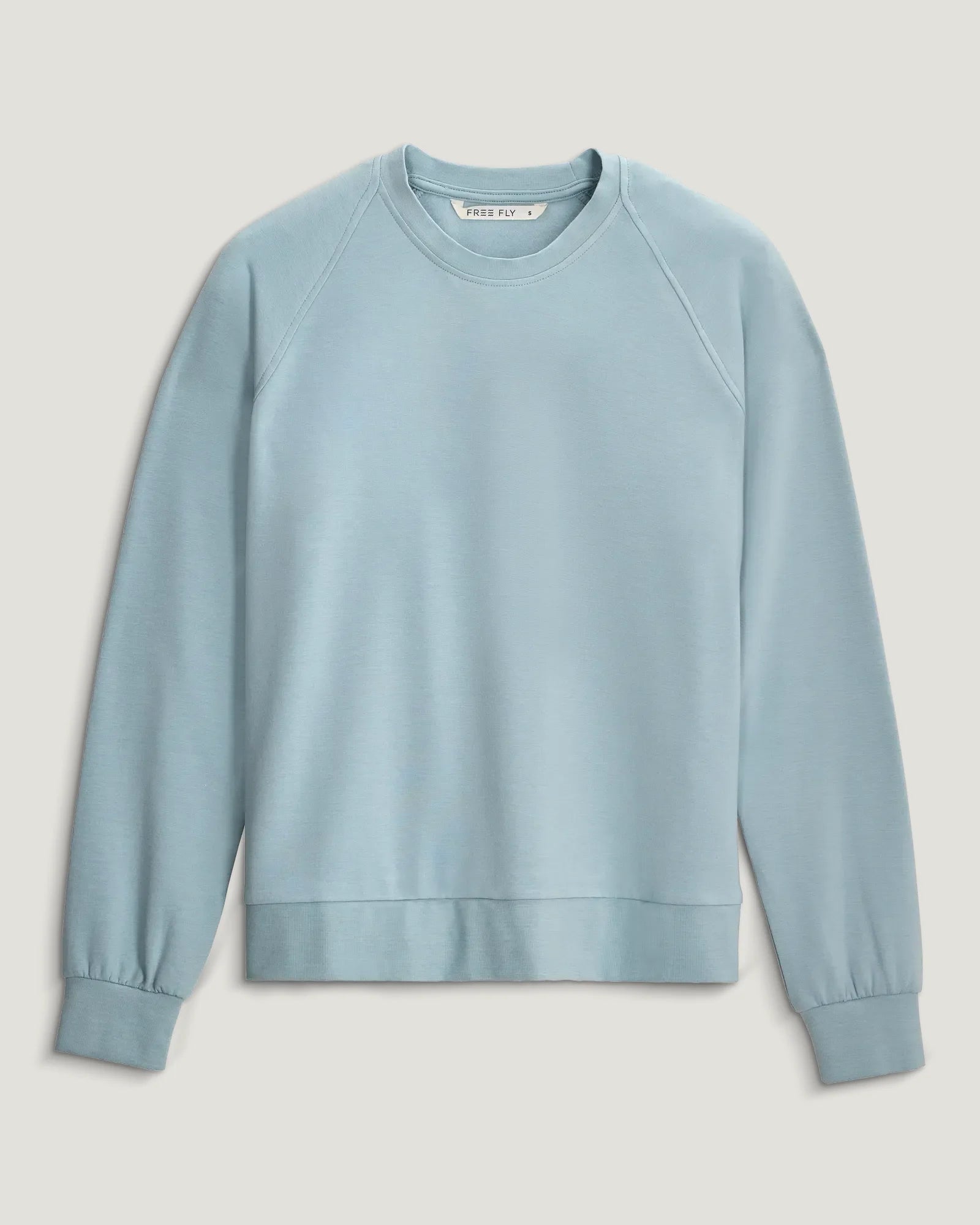 Light blue crewneck sweatshirt with raglan sleeves and ribbed cuffs, flat lay front view