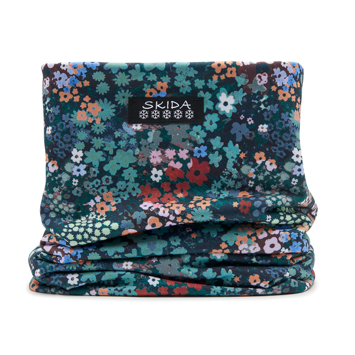 Floral print neck gaiter tube scarf with dark background and multicolor small flowers, folded flat