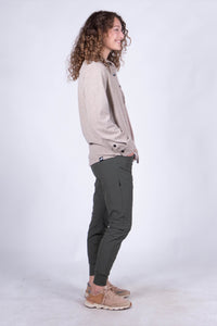 Women's fleece button-up shirt in light heathered tone, side view on model
